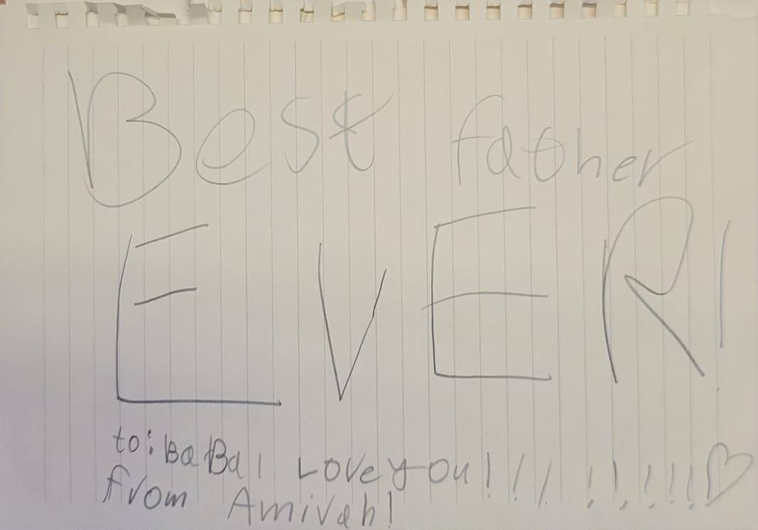 A handwritten note, 'Best father ever'